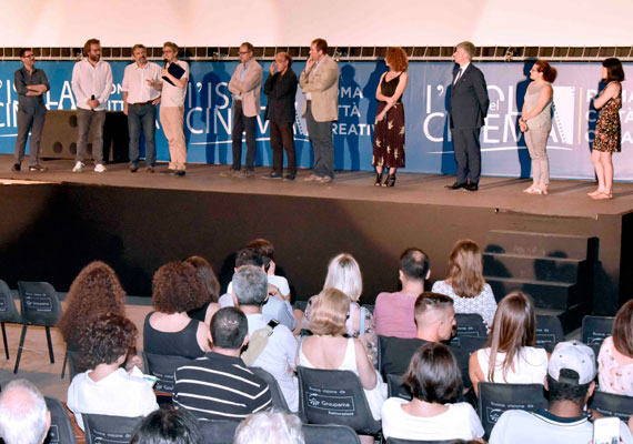 The press room at L’Isola del Cinema awards Pif
